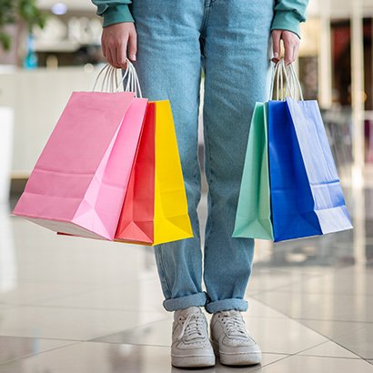 hans-holding-colorful-shopping-bag-2